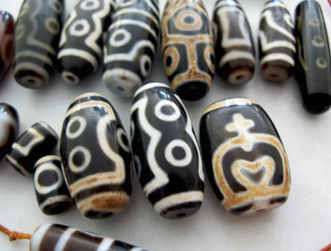 Embrace the Spirituality of Dzi Beads: Purpose and Wearability Guide